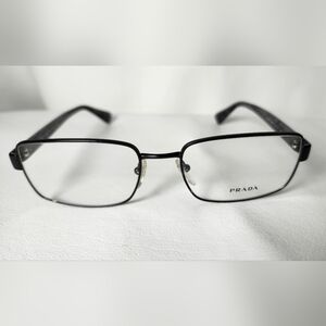 PRADA Eyeglasses with factory glass.